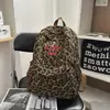 Mochila Estampada de Leopardo para Estudantes Universitárias, Design de Nicho, Mochila Escolar Leve, Tendência da Moda Americana, Mochila para Esportes e Deslocamento