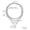 Collar Europeo y Americano Transfronterizo Femenino Sentido de Alta Gama Colgante de Corazón de Metal Explosión de Amazon Collar de Amor Multicapa ECG