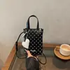 Nova bolsa de celular mini de bolinhas estilo coreano para o início do outono de 2026, bolsa transversal de nicho e única, bolsa quadrada pequena da moda para o dia a dia