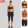 Conjunto de ropa de yoga transfronterizo con sujetador deportivo de cuello halter con sensación de segunda piel y conjunto de pantalones de fitness de secado rápido de cintura baja para correr y ciclismo al aire libre