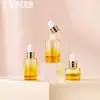 Botella de Vidrio Redonda Recta de Fondo Grueso Forro Gradiente Amarillo 30G15Ml20Ml30Ml40Ml80G Set Stock Disponible Fabricante