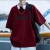 Nueva camiseta de manga corta para hombre, estilo coreano de verano, moderna, sencilla, de media manga, estilo Hong Kong, holgada, informal, de marca.