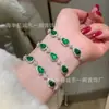 Venta al por mayor de fábrica pequeño rojo departamento material natural peligroso Yang verde calabaza jade pulsera s925 plata incrustada nuevo diseño chino