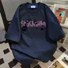 Camiseta de Manga Corta con Estampado de Letras Graffiti Estilo Nuevo Verano 2025 para Mujer Estilo Coreano Estilo Ins Casual Holgada Ropa de Trabajo Superior