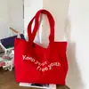 Bolso de lona con estampado de letras para mujer, nuevo y moderno bolso tote de moda primavera-verano 2026, bolso de hombro de gran capacidad estilo universitario