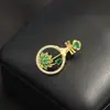 Broche de piano de luna de loto de esmalte de nicho para mujer, temperamento antiluz, accesorios de pin para traje de vestir exquisito de alta gama