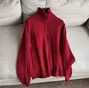 2025 Nuevo Estilo Suéter Corto de Punto de Lana de Cuello Alto con Media Cremallera Retro Reductor de Edad para Mujer Venta al por Mayor H01As2922