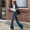 Jeans skinny azul escuro elástico de cintura baixa estilo Yi Mengling feminino 2026 Outono emagrecedor hot girl calça micro flare