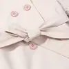 Venta al por mayor de ropa para mujer estilo europeo y americano transfronteriza INS, nueva colección de otoño, estilo elegante para ir al trabajo, cuello alto, cinturón de corbata, gabardina de doble botonadura