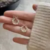 Pendientes Coreanos de Plata S925 con Aguja, Pequeño Lazo de Dongdaemun, Pendientes de Botón con Temperamento de Celebridad de Internet para Mujer, Novedad 2024