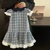 Vestido de Niña Verano Nuevo Estilo Niña Pequeña Solapa Pequeña Manga de Volante Falda Moda Niños Falda de Encaje Cuadros de Verano