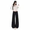 Jeans flares de cintura baixa em denim cru estilo americano para mulheres, novas calças largas de corte solto da moda