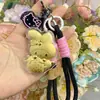 Venta al por mayor de Cadenas para Teléfono Melody Gold, Dijes para Bolsos y Llaveros Hechos de Oro Puro 999, Mismo Estilo que Shuibeike