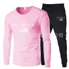 Nuevo Conjunto de Dos Piezas de Camiseta Cómoda de Cuello Redondo de Manga Larga de Moda para Primavera + Pantalones Deportivos Camisa de Grupo para Actividades al Aire Libre Traje de Trabajo