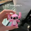 Llavero de Stitch LED sonido luminoso ILOVEYOU caricatura creativa regalo pequeño colgante de bolsa de pareja