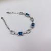 Plata S925 chapada en platino con incrustaciones (Topacio azul Londres) pulsera