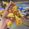 Llavero colgante creativo de niño niña soplando burbujas lindo caricatura pareja llavero de mochila pequeño regalo al por mayor
