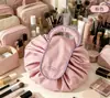 Nueva bolsa de maquillaje perezosa para mujer, portátil, de gran capacidad, para viaje, con cordón, para el cuidado de la piel, caja de alta calidad