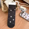Calcetines de punto de lunares con lazo para otoño e invierno para mujer, calcetines apilados de encaje estilo coreano ins, calcetines versátiles, venta al por mayor desde Zhuji