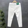 Cyber Popular Jeans Negros Puros para Hombre Marca de Moda Slim-fit Pantalones Recortados de Pie Pequeño Pantalones Casuales Blancos para Hombre Tipo Espiritual