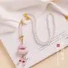 Nuevos Accesorios Chinos Qipao Brocado Song Colgante de Calabaza Collar de Perlas Estilo Étnico para Mujer Estilo Chino Temperamento Cadena Larga para Suéter