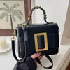 Bolsa pequena de mão de nicho com senso de design transfronteiriço feminina nova retrô alta aparência bolsa quadrada pequena para trabalho ombro único transversal
