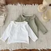 INS otoño e invierno bebé tejido fino muñeca solapa manga larga top bebé niña tapeta interior camiseta base