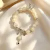 Nuevo brazalete de cuentas de vidrio de alta gama con estrellas y mariposas, brazalete para parejas y mejores amigos, joyería simple de estilo Ins al por mayor