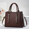 Bolso de nuevo estilo, simple y elegante, moderno y versátil, bolso de mujer para un hombro o cruzado, gran capacidad, versión coreana, bolso casual de moda