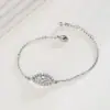 Nueva joyería transfronteriza Pulsera Ojo de Diablo cobre chapado en oro pulsera de circón con incrustaciones de diamantes pulsera de pareja en stock venta al por mayor