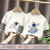 Camiseta de manga larga a rayas de algodón puro para niño, estilo dos piezas falsas, ropa de otoño, nuevo modelo primavera y otoño 2026, camiseta básica para niño pequeño