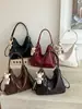 Bolso de hombro liso nuevo para principios de otoño de 2026 para el trabajo y los desplazamientos, bolso cruzado personalizado informal de gran capacidad a la moda