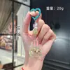 Chaveiro de Coelho com Cabeça de Desenho Animado e Glitter Pingente Exquisito para Meninas Pingente com Contas Acessórios para Carro Pingente de Alta Qualidade