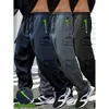 Pantalones de trabajo de moda de primavera y otoño transfronterizos de Amazon con cordón en el bolsillo para hombre, pierna recta, versátiles, casuales, largos, al por mayor, en stock