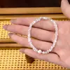 Pulsera de cristal blanco y perla plateada de lujo ligero, estilo primavera-verano, diseño nicho de Instagram, joyería de alta gama