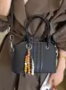 Yozzi 2026 principios de otoño nueva moda de moda bolso de hombro cruzado de gran capacidad, elegante bolso de mano tipo cubo para el trabajo