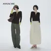 Conjunto elegante de ANNACHIC: un look de dos piezas con una camiseta de manga larga color block/usada como capa exterior/capa interior ajustada/camisa base