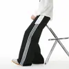 Calça Casual Masculina Outono Moda Estilo Americano Color Block Listrada, Calça Esportiva Versátil de Perna Reta Larga Estilo College Americano