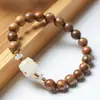 Sándalo verde DIY anillo de correr pulsera especificaciones 0.6 para hombre y mujer estilo simple cuentas Wen jugar joyería fabricantes al por mayor cuentas de Buda