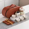 Conjunto de Chá de Viagem Estilo Antigo Conveniente Pequeno Conjunto Preparo de Chá ao Ar Livre Cerâmica Um Bule Três Xícaras Xícara Rápida Personalização de Logo Presente