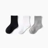 2026 Modelo Nuevo Paquete de Tres Pares de Calcetines de Algodón Transpirables de Color Sólido para Niños Mayores, Niños y Niñas, Calcetines Escolares, Calcetines Cortos Deportivos de Alto Rendimiento