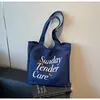 Mochila Tote para Mujer Retro Transfronteriza de Gran Capacidad 2025 Nueva Bolsa Tote Simple Bolso de Hombro Versátil para Viajeros