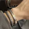 Joyería de Acero de Titanio Transfronteriza Pulsera Abierta de Cable de Acero Trenzado para Hombres Simple y Versátil con Acero Inoxidable Precio de Fábrica al por Mayor
