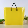 Bolsas de embalaje para ropa al por mayor, bolsas de mano de plástico de color liso, bolsas de compras para regalos de Año Nuevo, logo personalizado
