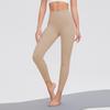 Procesamiento y personalización de pantalones de yoga para mujer, leggings de cintura alta con cepillado de doble cara, pantalones deportivos de fitness con realce de glúteos color piel OEM.