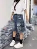 Shorts de mezclilla rotos con graffiti para mujer, estilo fino de verano, nuevos pantalones de cinco puntos de estilo americano 2026, talla grande, adelgazantes para mujeres de talla grande