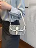 Bolso Transfronterizo para Mujer 2026 Nuevo Modelo Textura Retro Europea y Americana Estampado Bolso de Hombro Estilo Monograma de Letras de Nicho Elegante Bolso Cruzado