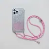 La nueva funda de teléfono móvil degradado para viajero es adecuada para Apple 15PROMAX comercio exterior 14/13 personalidad 12 cordón 11
