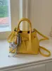 Bolso tipo cubo de moda transfronterizo estilo coreano para mujer, nuevo modelo de verano 2026, bolso de mano de alto valor, bolso pequeño de hombro y cruzado