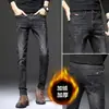 Invierno 2023 nuevos jeans gruesos con forro polar moda masculina marca pantalones harén moda pantalones versátiles